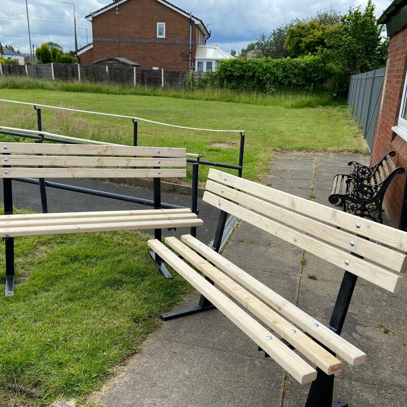 A pair of refurbished benches for a local resident